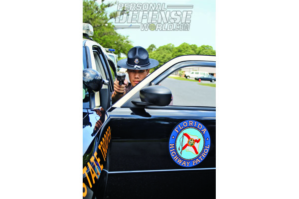 Trooper David Roan drills on felony procedures. His new GLOCK 37 Gen4 is in his dominant hand as his support hand controls shoulder-mounted radio mic.