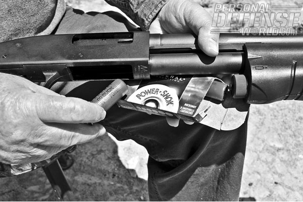 The Mossberg 500 Persuader 12 gauge holds six shells of 00 buchshot, plus one in the chamber.