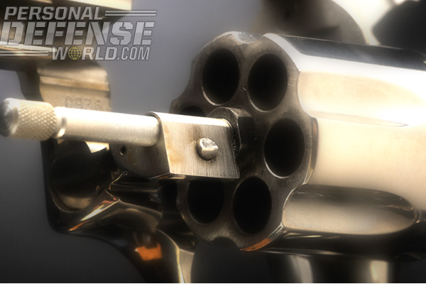 The forward lock for the cylinder is not at the end of the ejector/ejector rod, but locks securely into the frame.