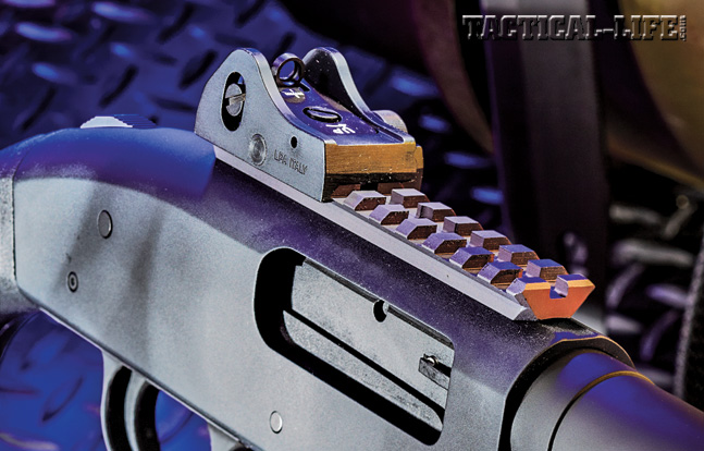 The 590A1’s ghost ring rear sight is quite effective, and the Picatinny rail on top of the receiver also allows operators to mount an optic or red-dot sight if so desired.