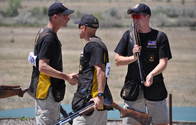 U.S. Army Marksmanship Unit Soldiers Staff Sgt. Glenn Eller (left), Staff Sgt. Josh Richmond (center), and Staff Sgt. Jeff Holguin (right) prepare to compete at a match last year. The three USAMU Shotgun shooters qualified to represent the country on the U.S. National Shooting team at the International Shooting Sports Federation World Championships in the fall. The three shotgun shooters swept the podium at the USA Shooting Spring Selection match March 23 in Kerrville, Texas in Men's double trap.