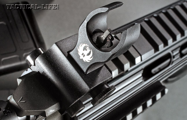 The rifle comes with folding backup iron sights, including an elevation-adjustable front sight