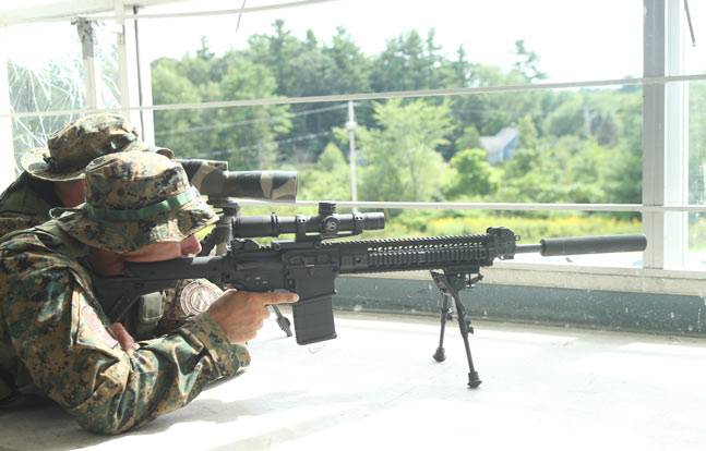 Sig Sauer equips the rifle with a long quad-rail handguard for mounting accessories, a collapsible Magpul UBR stock and Troy backup sights. (Photo Courtesy: Sig Sauer)