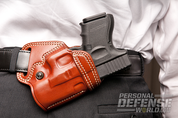 Hideaway Holsters: 8 Ways to Covertly Carry Your Weapon - Small Of The Back Carry