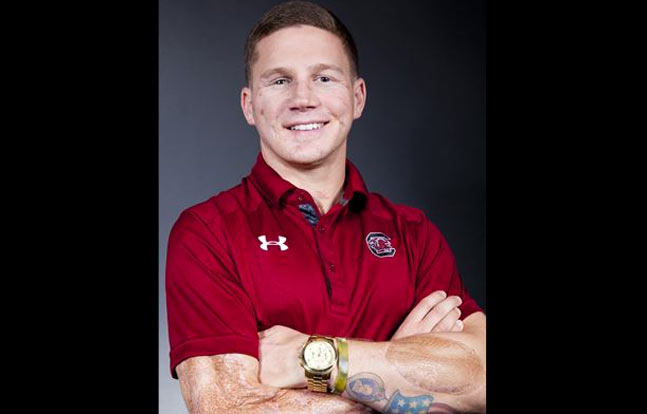 Marine veteran Cpl. Kyle Carpenter poses for a photo. Carpenter will receive the medal from President Barack Obama, June 19, 2014. He will be the eighth living recipient of the Medal of Honor for actions in Iraq or Afghanistan. (Photo by Cpl. Michael Guinto)