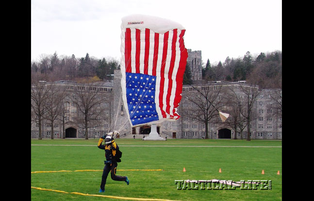 U.S. Military Academy and the U.S. Naval Academy cadets try to hit the center of the landing zone during an inter-service parachute competition at West Point.