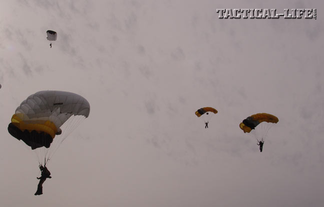 U.S. Military Academy and the U.S. Naval Academy cadets try to hit the center of the landing zone during an inter-service parachute competition at West Point.