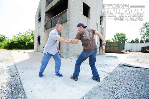 If your attacker is taller, or reaches toward your face with his left hand, reaching over his arm to control it may not be practical.