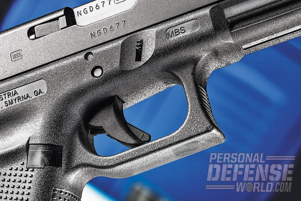 The Glock 22’s paddle trigger is one of three safeties making up the pistol’s Safe Action firing system.