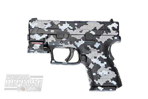 The author's camo-DuraCoated Springfield XD pistol.