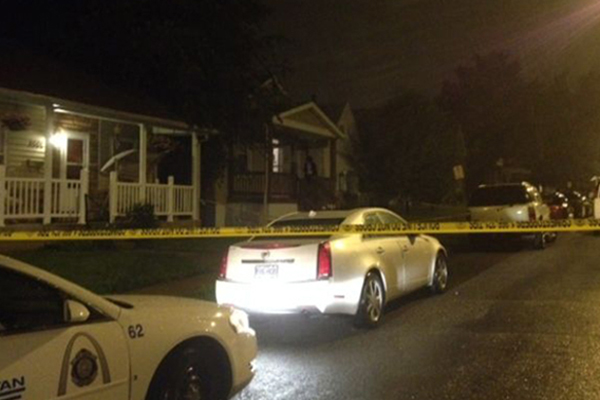 The scene outside of the home invasion on Monday (CREDIT: Valerie Schremp Hahn; St. Louis Post-Dispatch).