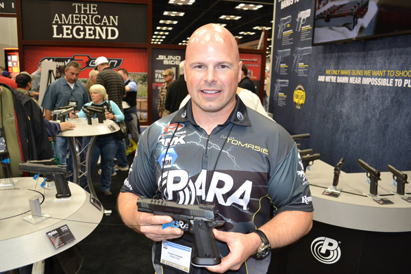 Travis Tomasie showing off the Tomasie Custom at the NRA Annual Meetings and Exhibits. (Photo: Facebook)