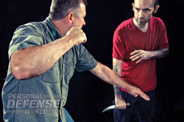 Once you pin and secure the weapon hand of your attacker, follow up with an onslaught of strikes to take him down hard!