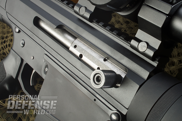 The side-charging handle is the only thing differing from standard AR-15 operation.