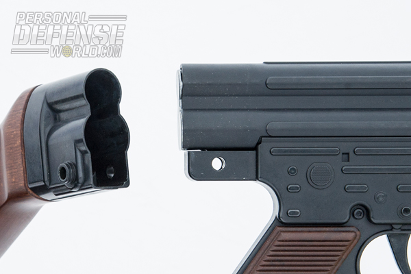 The upper receiver separates from the buttstock group, allowing the bolt carrier to be removed for cleaning.