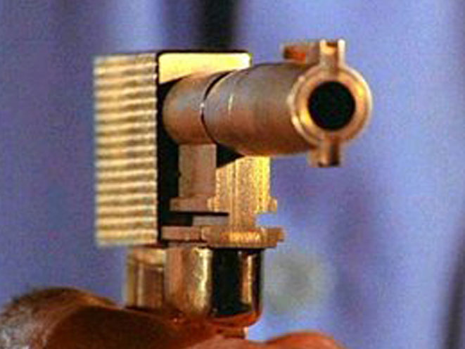 the man with the golden gun, golden gun, the golden gun, james bond golden gun, bond golden gun, golden gun photo