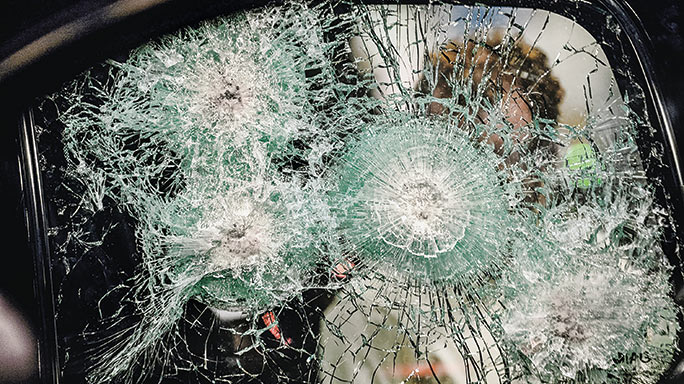 Shooting Through Glass lead