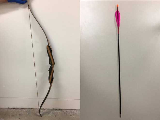 australia shooting bow and arrow