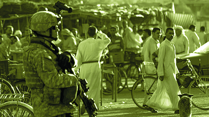 Josh Kinser surveying a marketplace