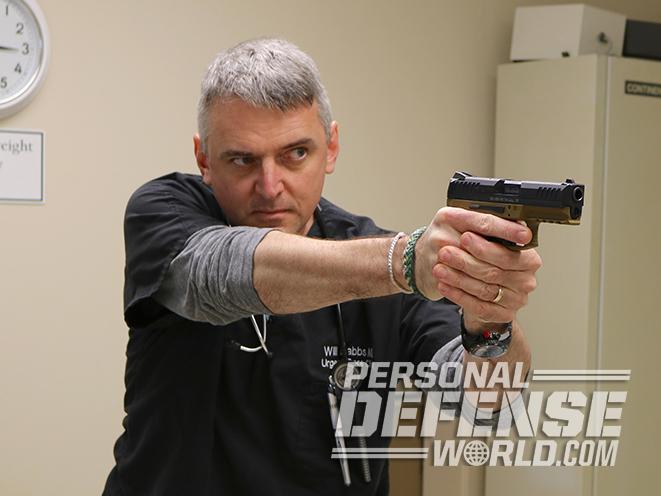 healthcare providers gun pointing