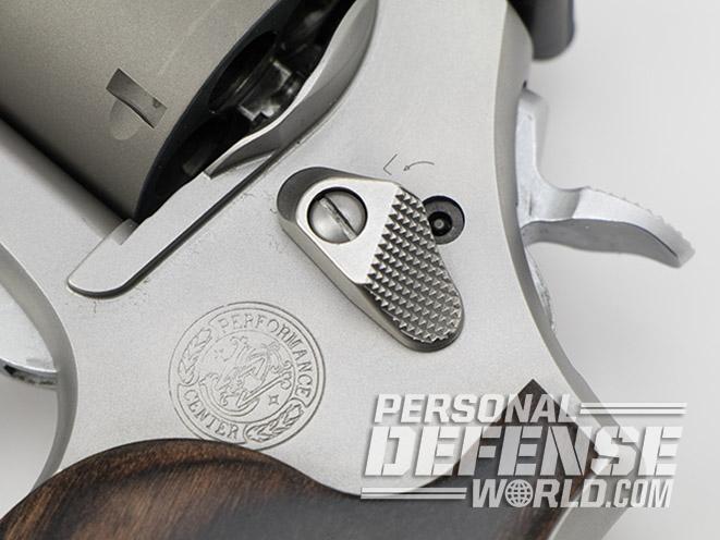 Smith & Wesson Performance Center Model 986 revolver cylinder release latch