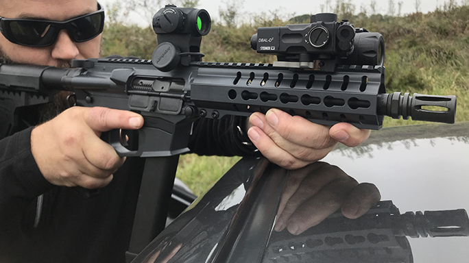 CMMG MkGs Guard rifle on car