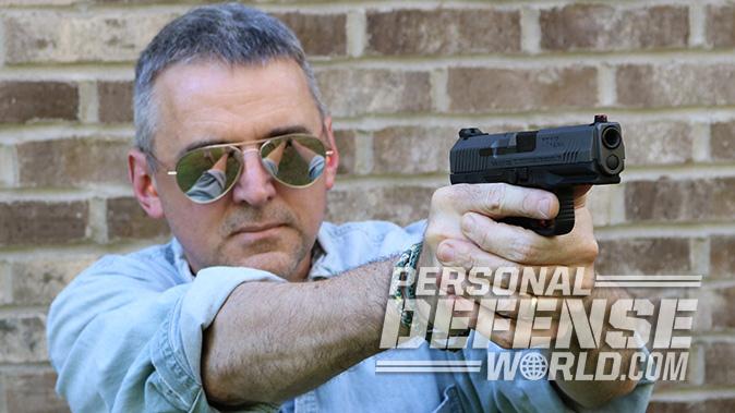 Canik TP9SF Elite-S pistol aiming