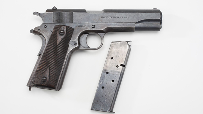 army surplus 1911 pistol with magazine