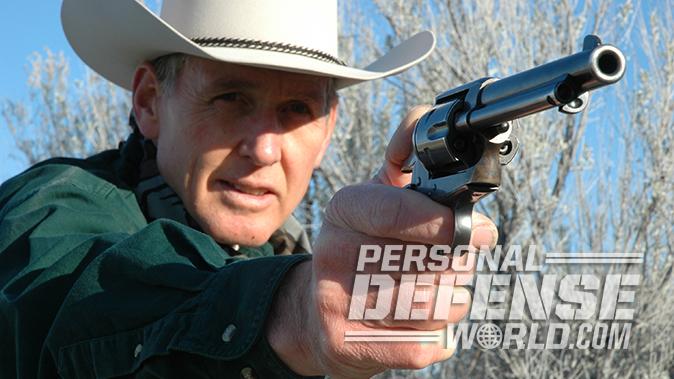 colt peacemaker revolver aiming