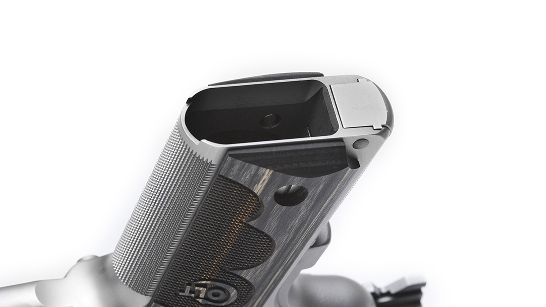 Colt Wiley Clapp Stainless Commander 1911 pistol magazine well