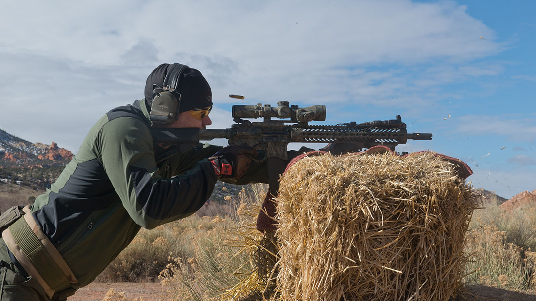 scoped carbine buck doyle hay bail shooting