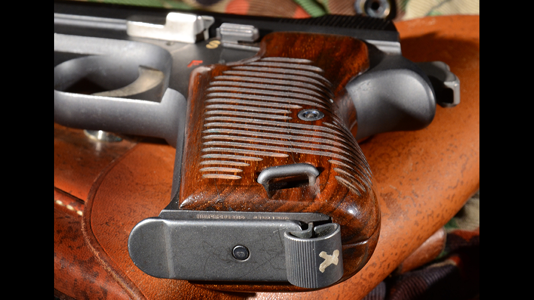 Sig P210 Target pistol magazine release