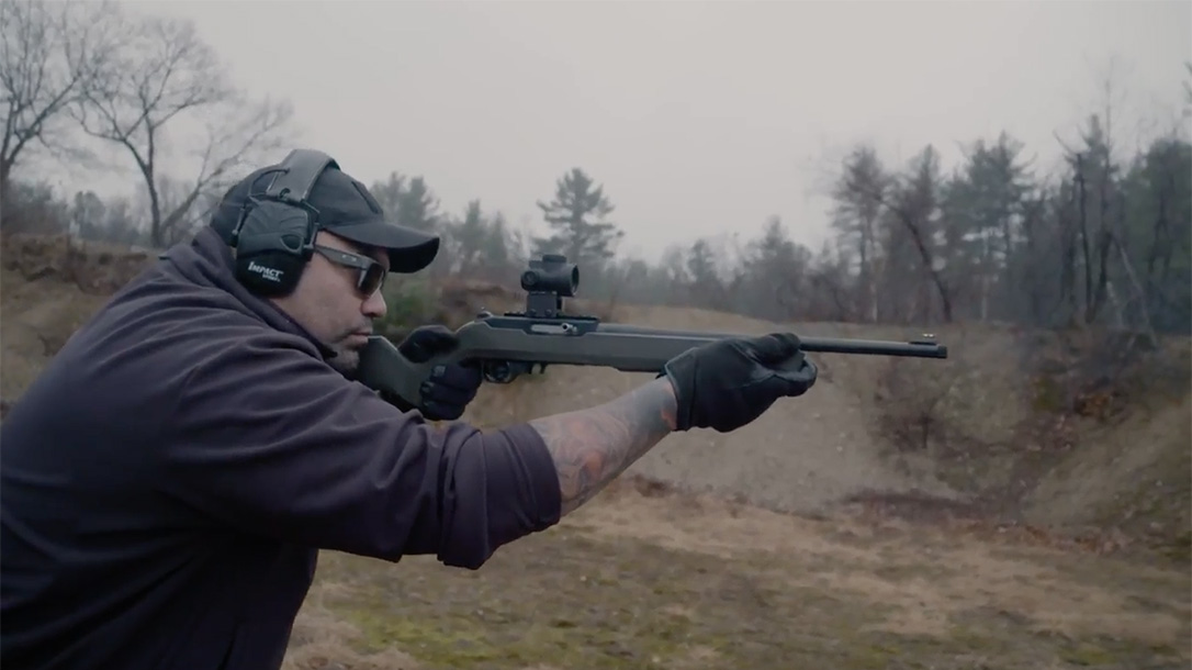 Thompson/Center Arms T/CR22 rifle shooting standing position