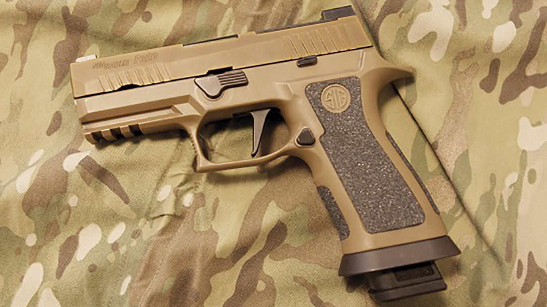 sig sauer p320 x-carry pistol denmark camo left profile