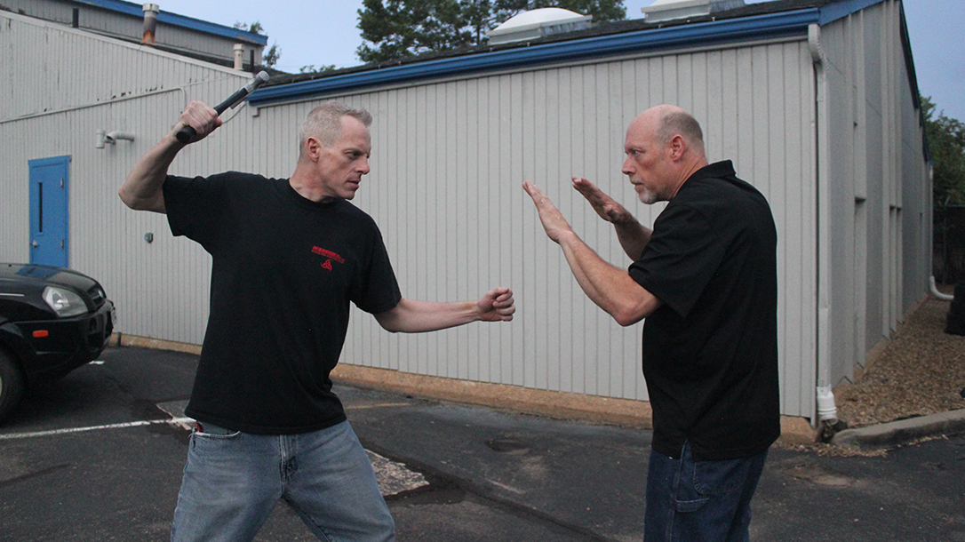 Shoulder Stop, self-defense, hammer, step 1