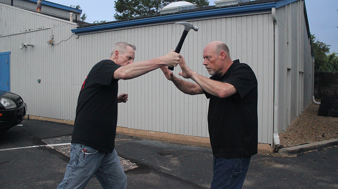 Shoulder Stop, self-defense, hammer, step 2