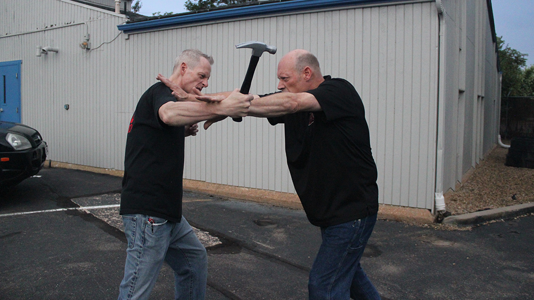 Shoulder Stop, self-defense, hammer, step 3