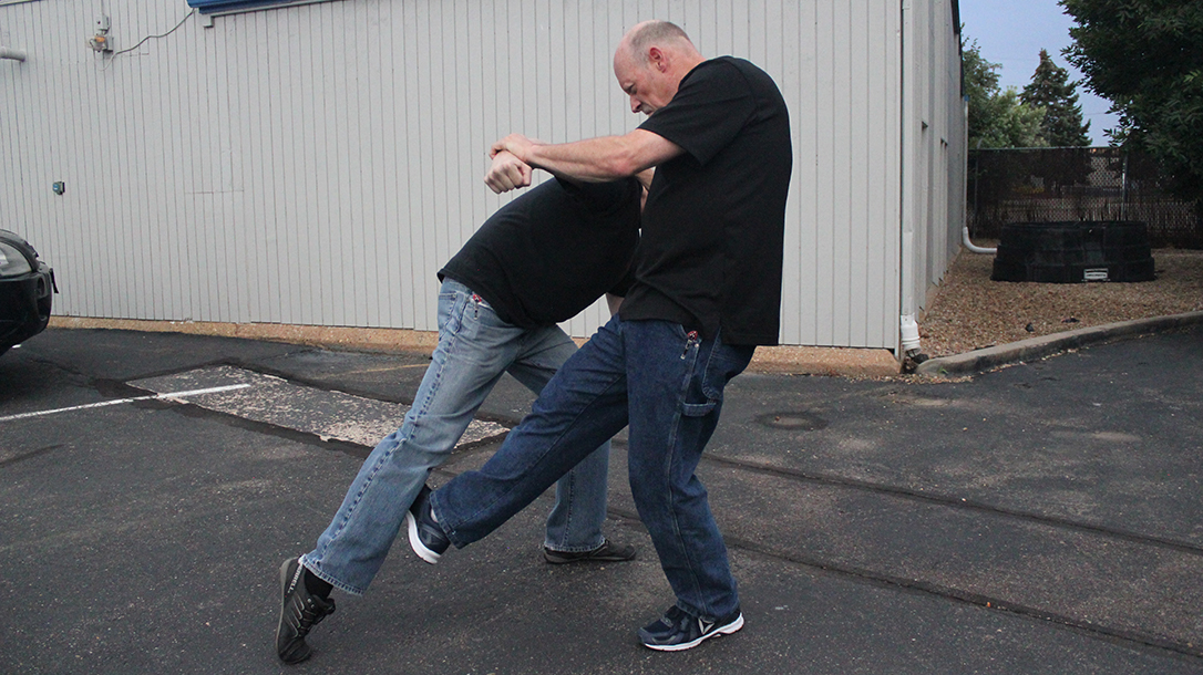 Shoulder Stop, self-defense, punch, step 5