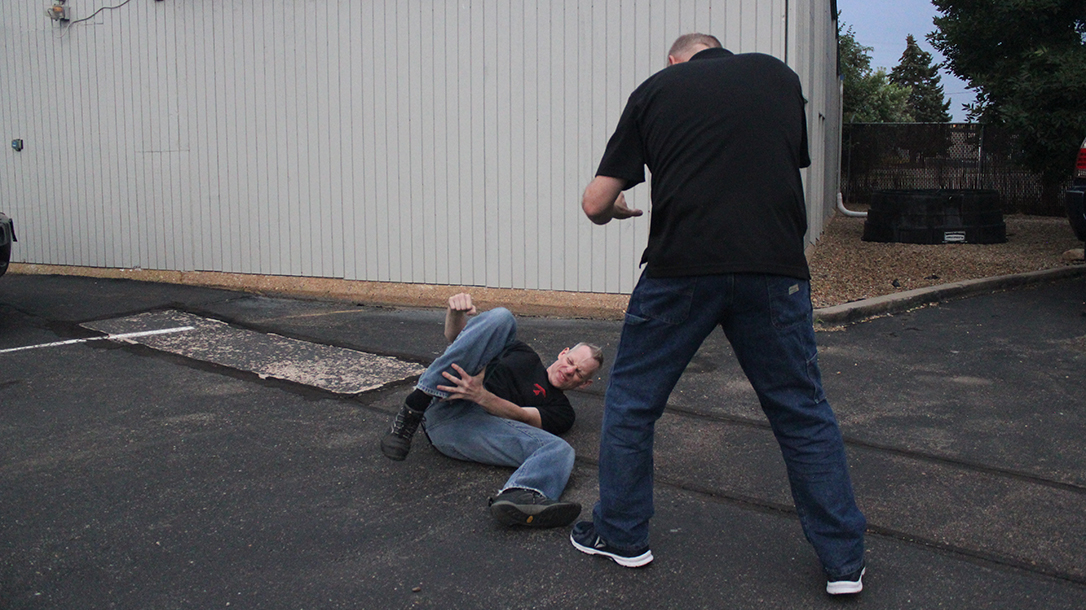 Shoulder Stop, self-defense, punch, step 6