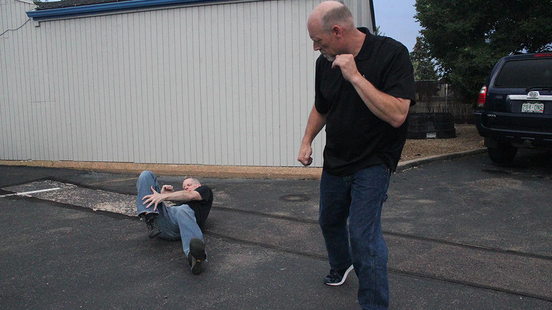 Shoulder Stop, self-defense, punch, step 7