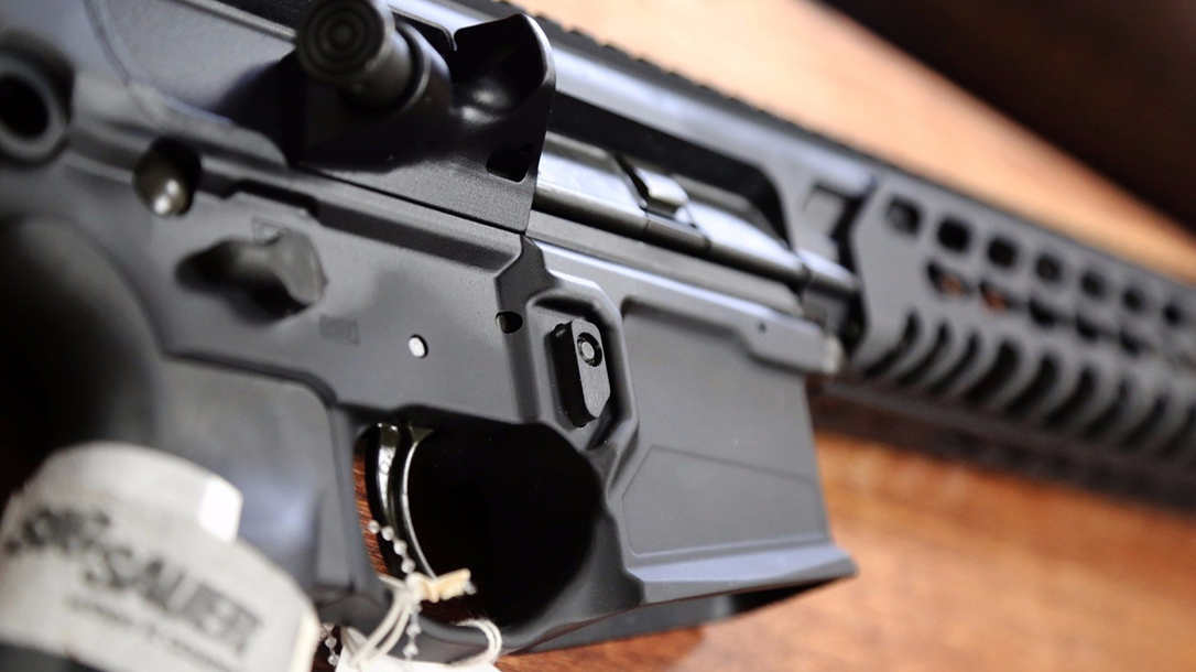 bullet button rifle closeup