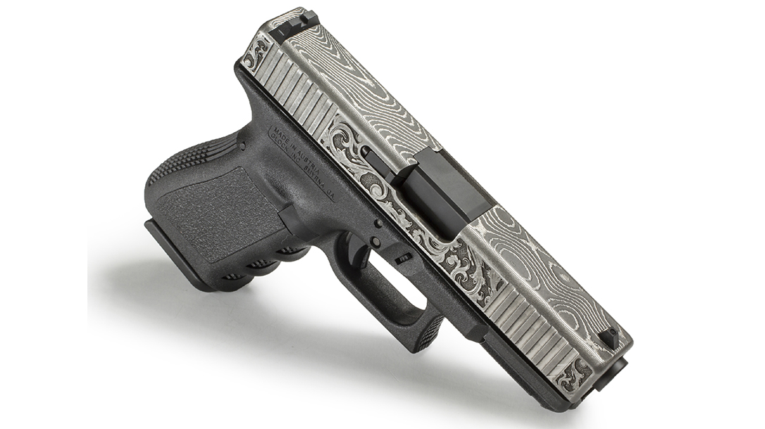 Damascus Steel Slide, scrollwork