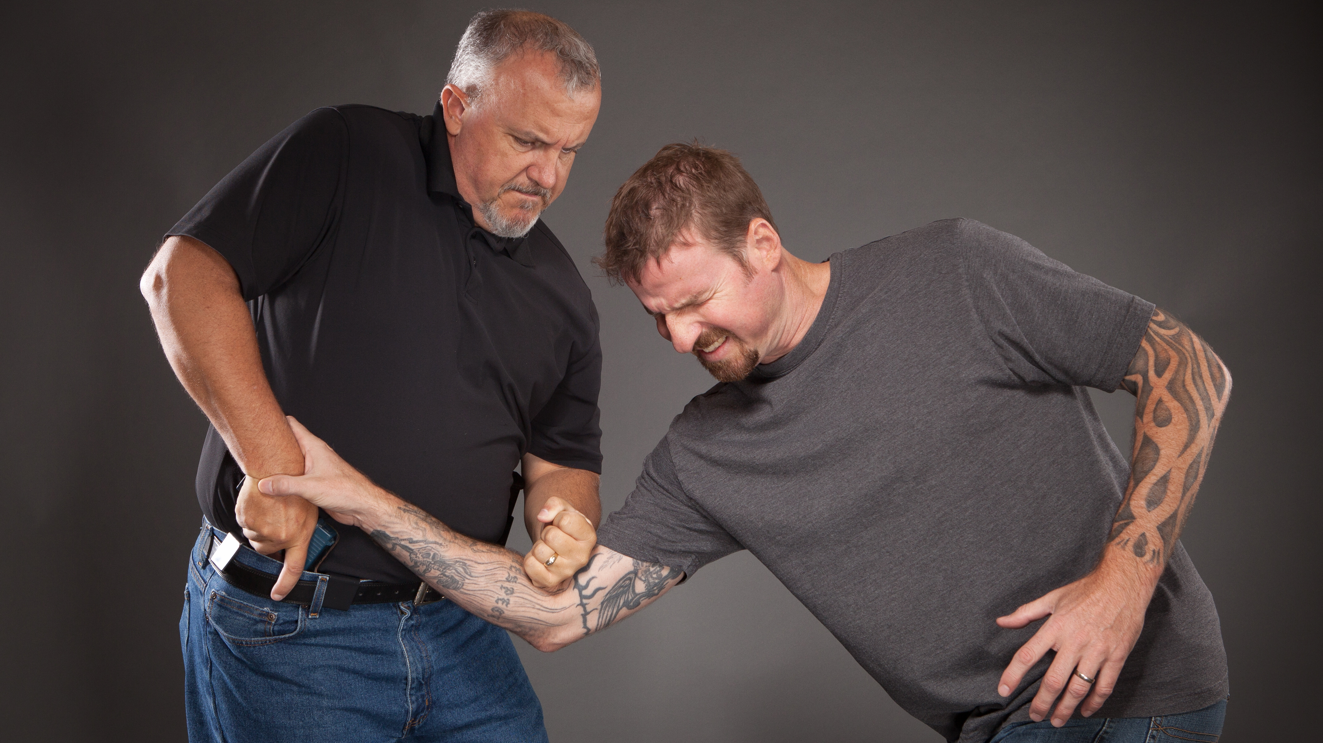 Learn how to protect your firearms when an adversary tries to snatch it.