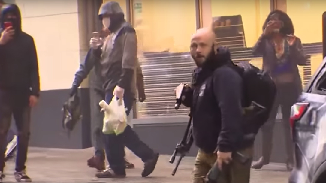 Security Guard disarms protestor rioter Seattle