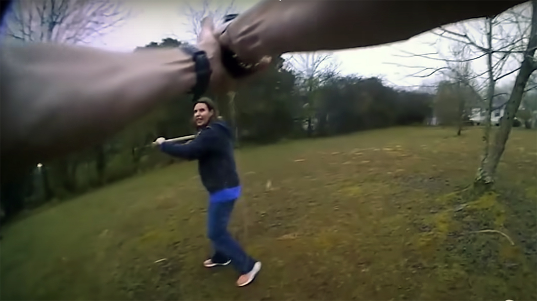 Nashville police shot a seemingly impaired Melissa Wooden, who charged an officer holding a bat and pickaxe.