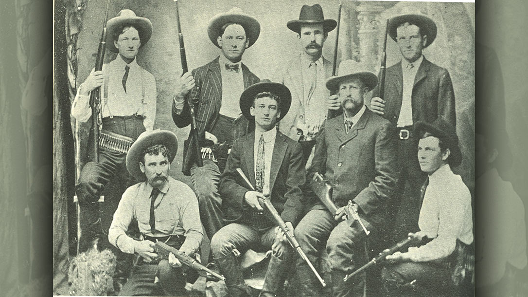 Model 1895 Winchesters of various barrel lengths and calibers equip these Rangers. The long cartridges with round-nosed bullets in the left-most Ranger’s belt suggest his rifle is chambered for the military’s short-lived .30-03 cartridge, the forerunner of the .30-06. – A look into Texas Rangers History.