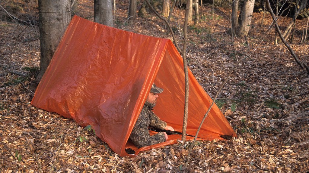 The tube tent is lightweight yet gives quick protection from inclement weather. Its orange color serves as a signal.