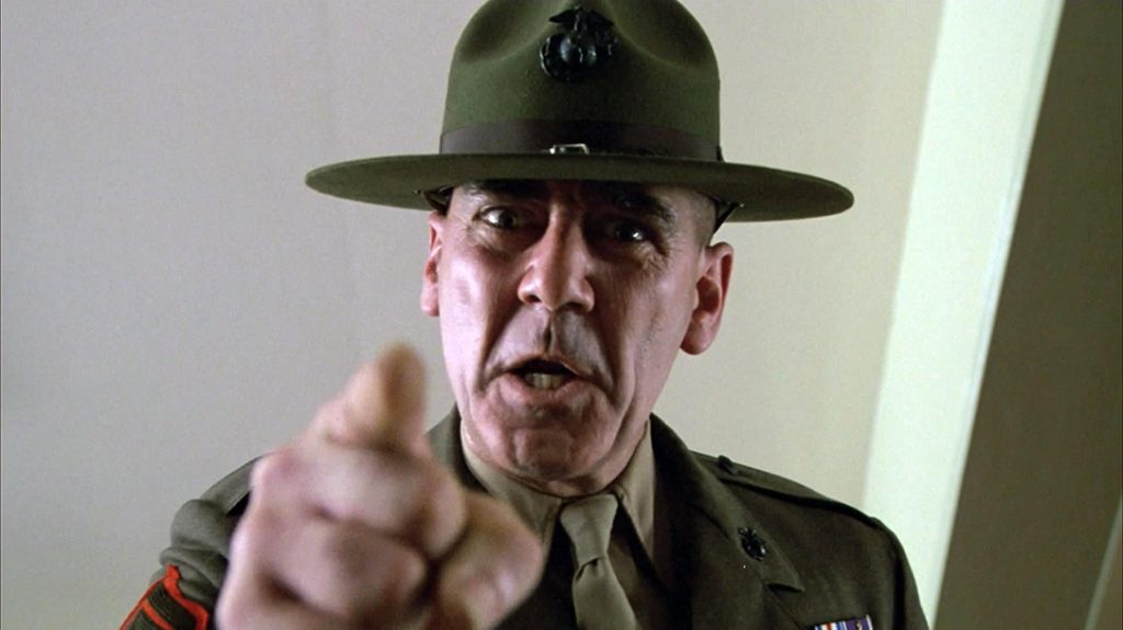 R. Lee Ermey as Gunnery Sgt. Hartman.