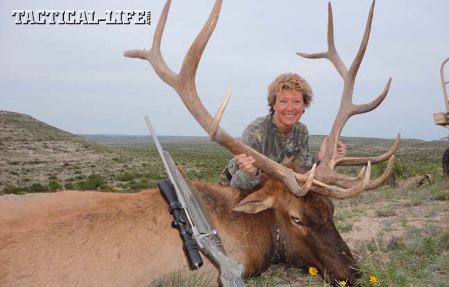 Joyce Wilson with the 6x7 bull she shot soon after arriving at the Longfellow Ranch. The bull took only three steps after she shot it once with her .30-06.