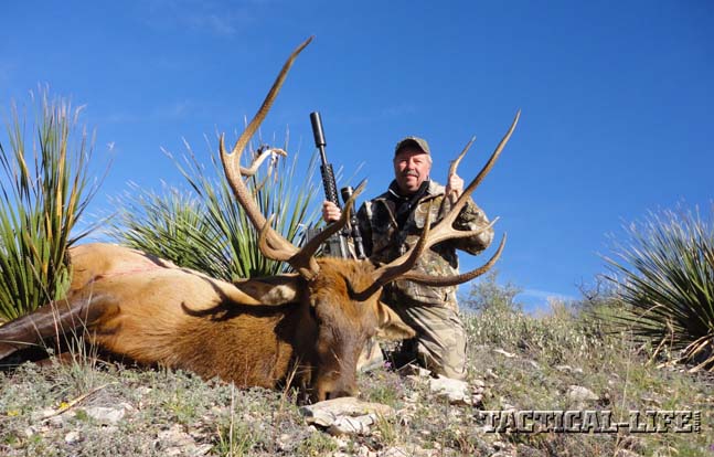 Bill Wilson poses with his 5x6 management bull. He needed all five days of his hunt before locating the bull and dropping it with one shot from his .458 SOCOM.